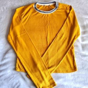 Small yellow long sleeve shirt